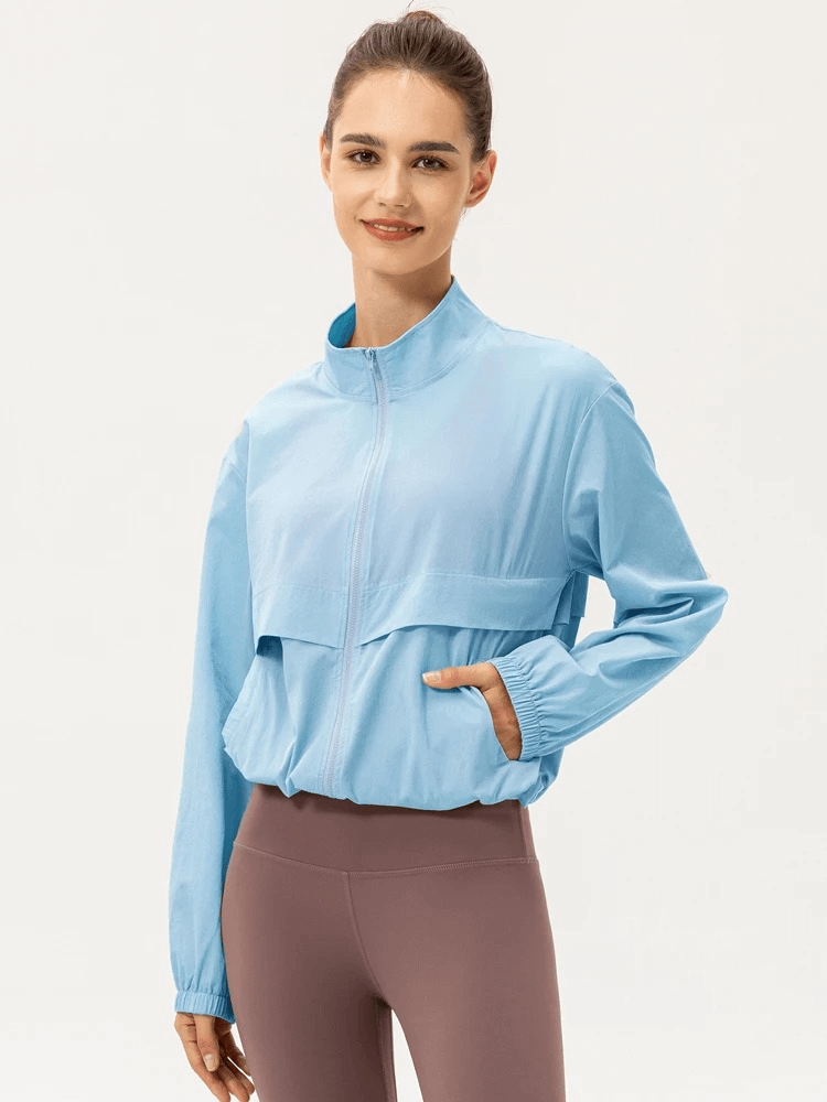 Women's UV protection running windbreaker SF1916 in blue, made of nylon and spandex, featuring a turn-down collar for outdoor activities.